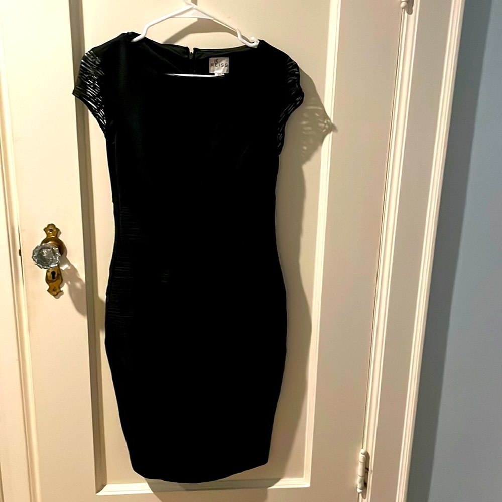 Black dress.  Viscose stretch.  From fitting.